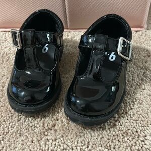 Patent black girls Mary Jane’s. Black dress shoes for girls.